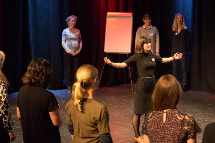 RADA Business participants stand in a semicircle.